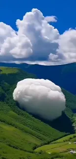 Scenic mountain valley with lush greenery and dramatic clouds.