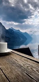 Steaming coffee cup with mountain and lake view.