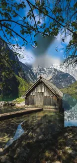 Mountain lake cabin scenery with reflections, surrounded by nature.