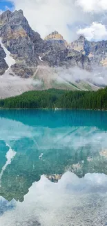 Stunning mountain lake with clear blue reflection and lush green forest.