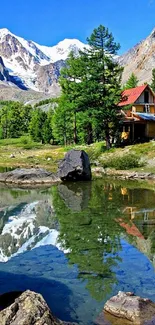 Scenic mountain lake with a cozy cabin and trees mirroring on the water.