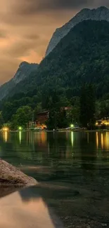 Peaceful mountain lake at sunset with vibrant reflections.