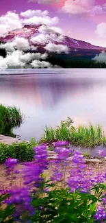 Serene mountain view with purple sunset reflection on the lake.