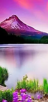 Serene mountain lake at sunset with vibrant purple sky and lush greenery.