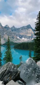 Serene turquoise lake with mountain backdrop and green pine trees.