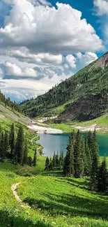 Serene mountain lake with lush greenery and clear blue sky.