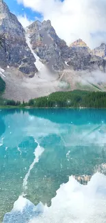 Serene mountain lake with clear waters and majestic peaks.