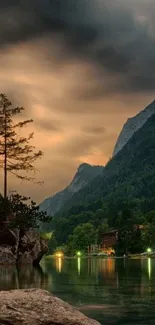 Scenic mountain lake with trees at twilight.