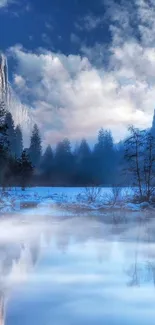 Serene mountain lake with misty reflections and blue sky.