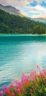 Serene mountain lake with pink flowers.