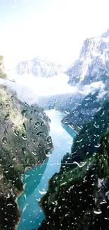 Serene mountain lake view with raindrop effect.