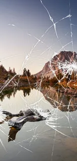 Serene mountain lake reflecting peaks at sunrise, perfect for mobile wallpaper.