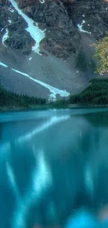 Serene mountain lake with blue waters and rocky peaks under a tranquil sky.