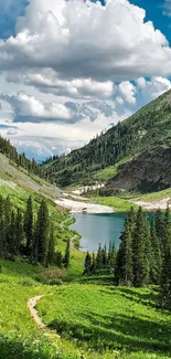 Peaceful mountain lake with lush greenery and fluffy clouds.