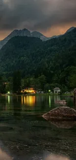 Serene mountain lake with forest and reflections.