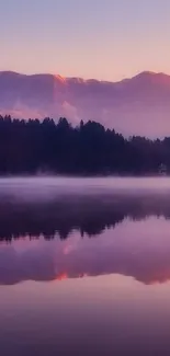 Serene mountain reflection at sunset with purple hues.