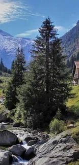 Mountain scene with lodge, trees, and a stream.