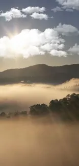 Mountain mist with sunlit clouds and fog over a serene landscape.