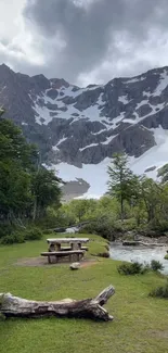 Mountain retreat with lush greenery and a tranquil stream.