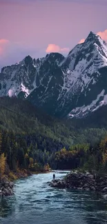 Stunning mountain river with snow-capped peaks at dusk.