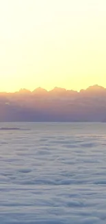 Serene sunrise over mountains with clouds, perfect for mobile.