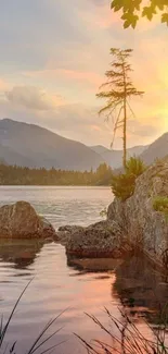 Beautiful sunset over a tranquil mountain lake.