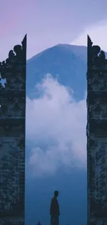 Mystical mountain temple framed in mist and blue hues.