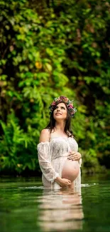 Pregnant woman in serene green nature with a water reflection.