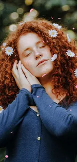 Peaceful woman with red curly hair and daisies on a dark green background.