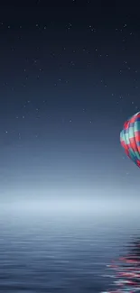 Hot air balloon over starry night water, serene and beautiful.