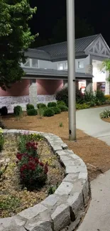 Nighttime garden path with flowers and soft lighting.