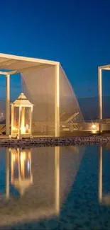 Serene poolside with lanterns under a midnight blue sky.