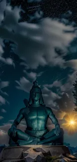 Meditative statue under starry night sky with glowing celestial light.