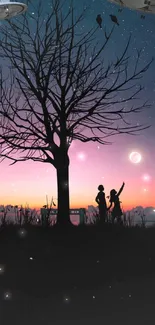 Children silhouetted against a starry night sky with a bare tree and vivid sunset.