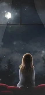 Girl looking out window at glowing moon in serene night sky.