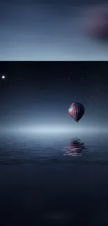 Hot air balloon floating in a serene starry night sky over a calm sea.