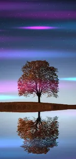 Solitary tree reflected in calm water under a starry night sky.