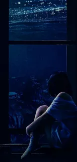 Silhouette of a woman staring out a large window at a starry night.