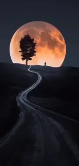 Wallpaper featuring a lone tree against a giant moon on a dark road.