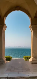 Mobile wallpaper of ocean view through an elegant arch.