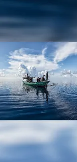 Small boat on calm ocean under a blue sky with clouds.