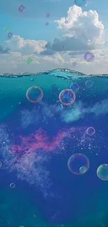 Serene ocean with bubbles under a dreamy cloudy sky.