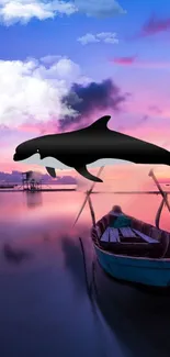 Whale above a boat during a vibrant sunset over the ocean.