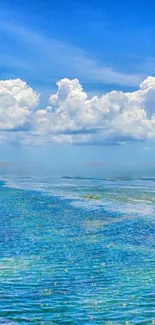 Beautiful ocean horizon with clouds and blue sky.