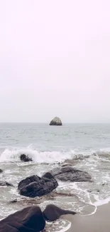 Serene ocean view with a distant rock.