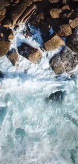 Aerial view of ocean waves crashing into rocks.