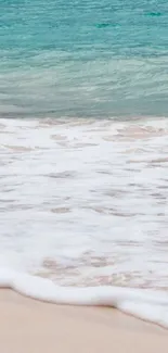 Serene beach scene with turquoise waves and dark storm clouds.