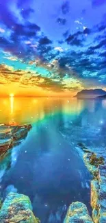 Serene sunrise over ocean with vibrant blue and yellow hues.