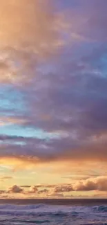 Scenic ocean sunset with vibrant sky and clouds.