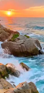 Serene ocean sunset with waves crashing on rocky shore.